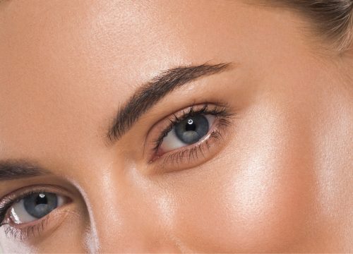 Woman's beautiful eyebrows after brow microblading