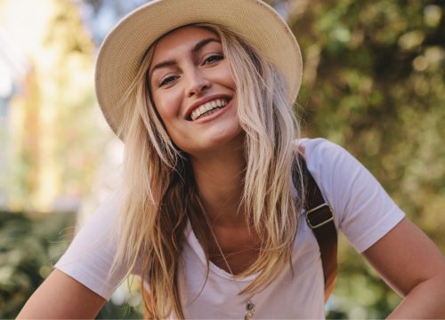 Woman wearing a hat on a bike ride