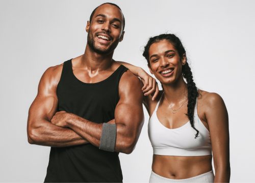 Happy couple after a workout at the gym