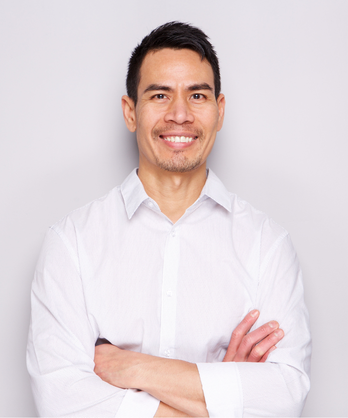 Happy man wearing a white dress shirt