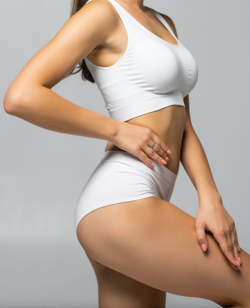 Woman's torso in white top